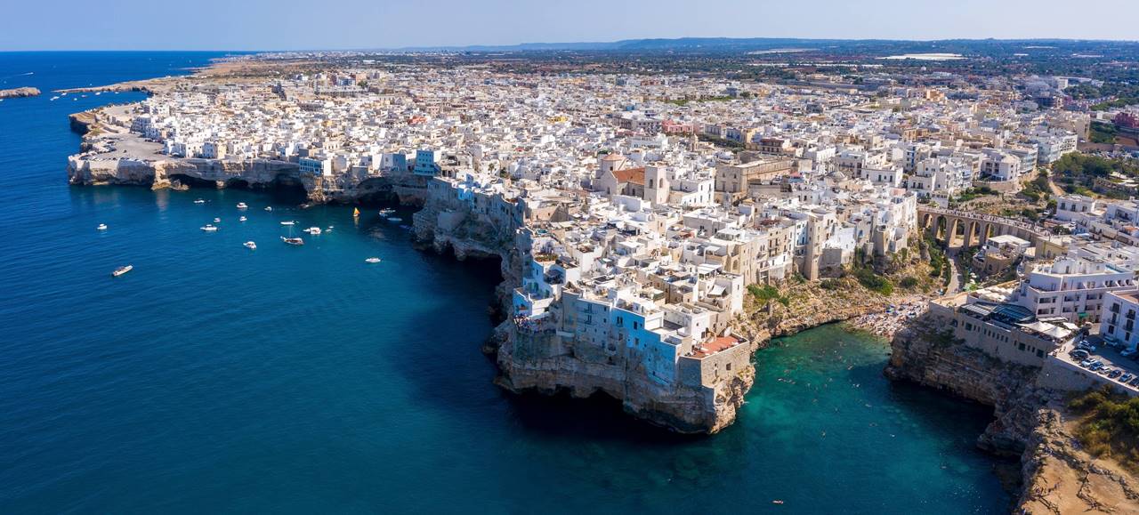 aerial-shot-of-the-adriatic-sea-and-cityscape-of-polignano-a-mare-town-apulia-southern-italy.jpg